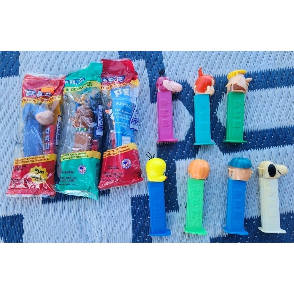 Vintage Pez Dispensers Feet Lot Of 10 NOS Flintstones Charlie Brown Pooh Holiday
